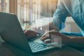 Man shopping online with laptop